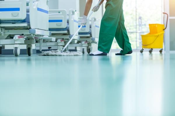 a janitor cleaning a medical facility