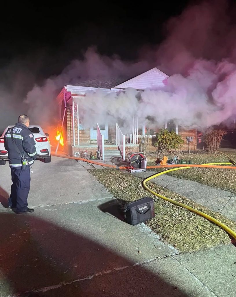 A house on fire, started by a dryer fire, in St. Clair Shores, Michigan.